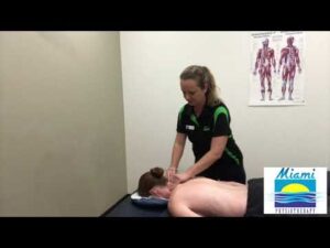 Learn how to give a 5 min relaxing shoulder and neck massage.