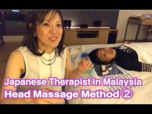 A Japanese Therapist demonstrates the Head Massage Method in Malaysia ②